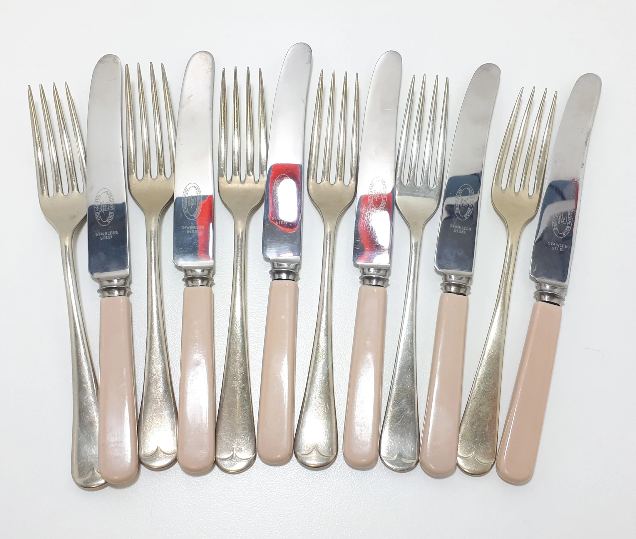 12 Piece Assembled Cutlery Set – 6 Atkinson Bros. Bakelite Knives & 6 Plated Forks From Different Cutlers